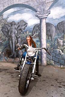 beautiful woman on a motorcycle